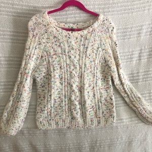 Soft white sweater with confetti like accents!